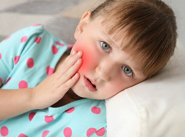 Child in dental chair for emergency dentistry