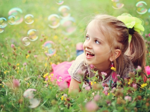 Toddler playing outside after children's dentistry visit