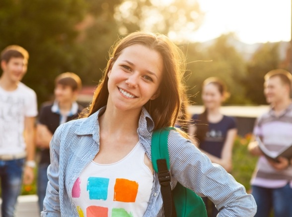 Teen smiling after dentistry visit