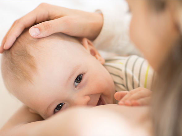 Mother nursing baby