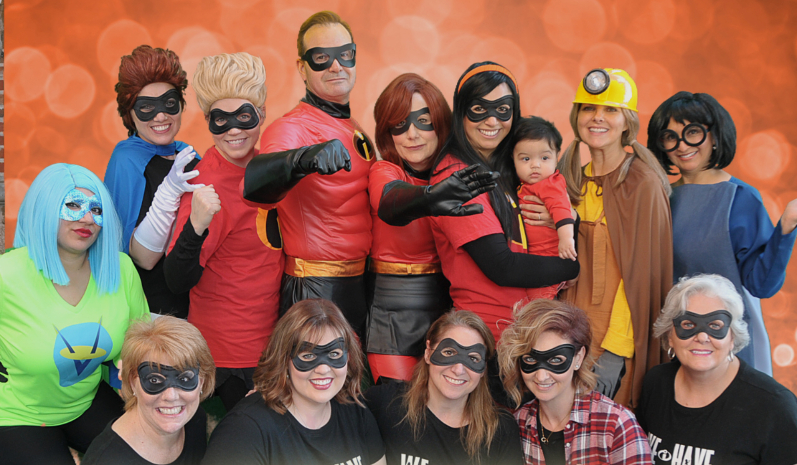 Coppell pediatric dentist and dental team dressed in superhero costumes