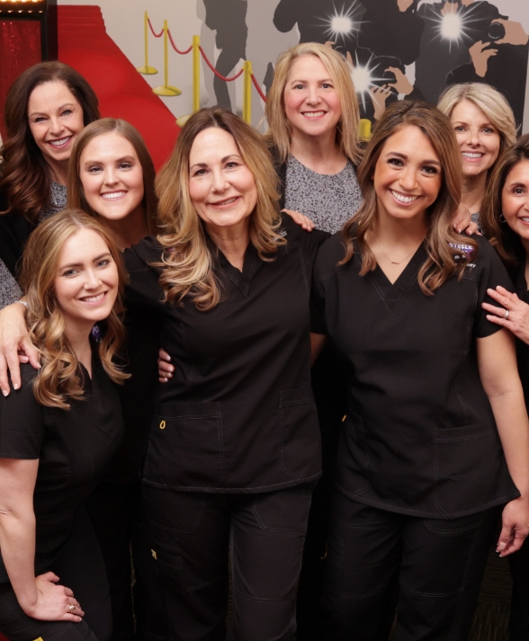 Doctor Steele and her pediatric dental team in Coppell