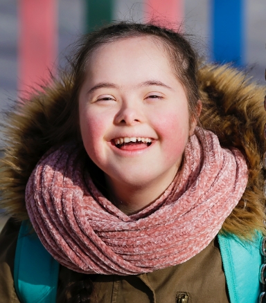 Child laughing after special needs dentistry visit