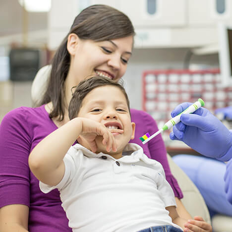 mom at dentist with child
