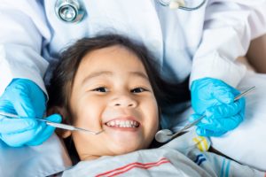 Little girl smiling during oral examination